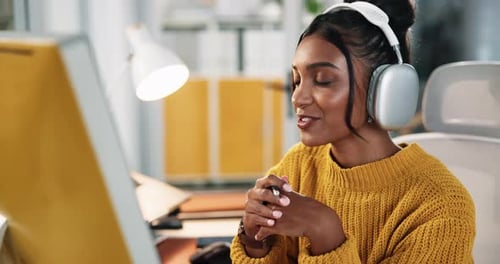 Woman Attends Virtual Meeting in Office