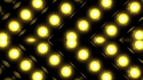 Bright yellow lights pulse rhythmically creating energetic party atmosphere