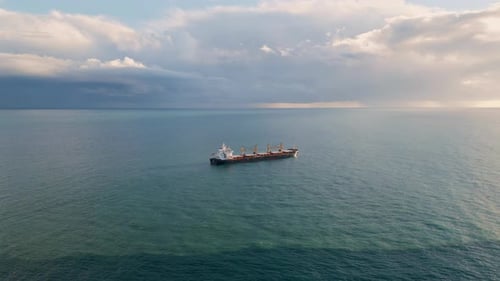 Container Tanker Floating at Endless Ocean Drone View. Panoramic Big Cargo Vessel