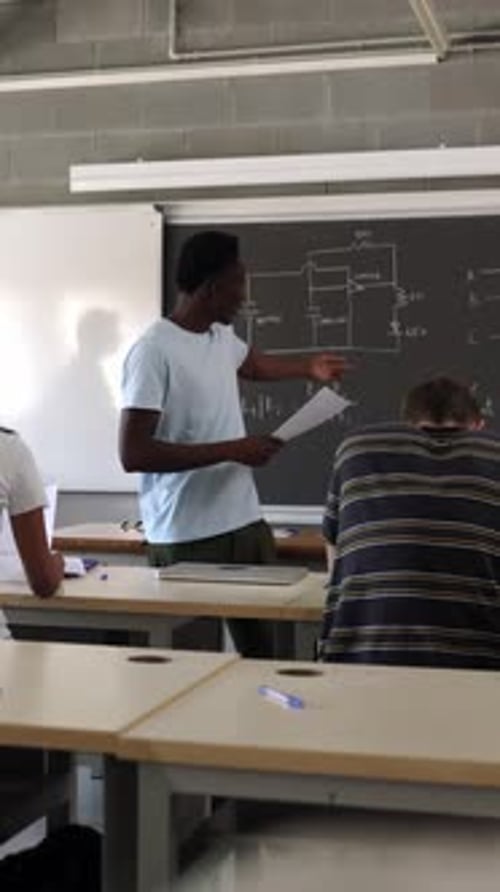 African High School Student Man Giving a Presentation at Classroom Friends