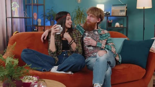 Couple Relaxing Together at Home on Couch