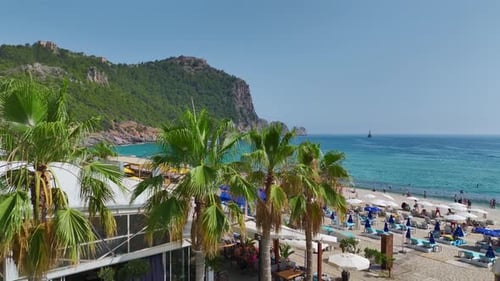 Aerial View Pristine White Beach on the Mediterranean Full of Water Fun and Sports