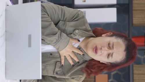 Adult Woman Coughing and Clutching Chest Painfully
