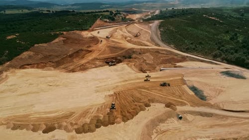 Earthmoving Construction Equipment in a Rural Landscape