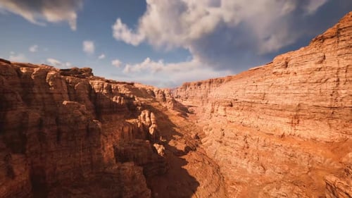Dramatic Gorge with Textured Foreground and Expansive Natural Features
