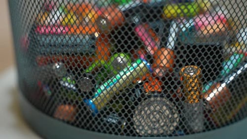 Trash Can Full of Used Batteries