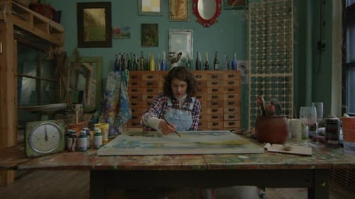 Painter Creating Masterpiece With Brush Female Artist Drawing Sitting in Workshop