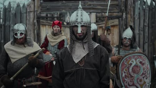 Portrait of Medieval Military Chief in Armour with Troop in front of Fort