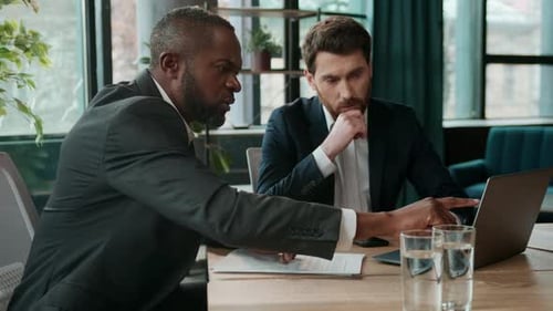 Two Diverse Men Multiracial Business Team Solving Work Online Project Problem Discussing Internet