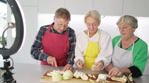 Seniors Preparing Food in a Modern Kitchen