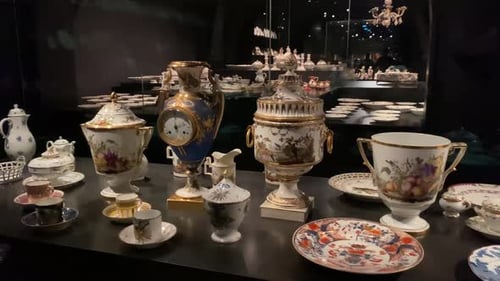 Visitors walking around the museum and magnificent historical antiques