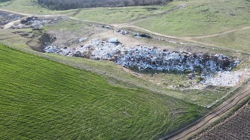 a City Dump Landfill Located Near the Arable Area