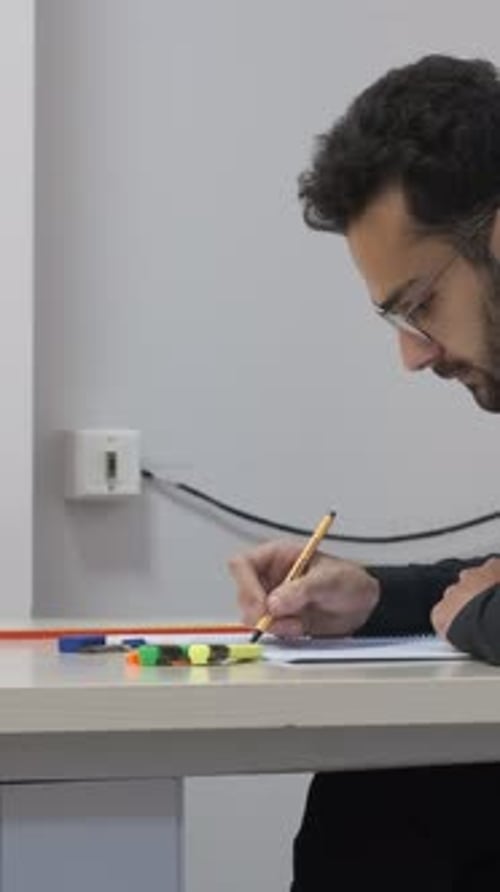 Stundent Sitting at Desk