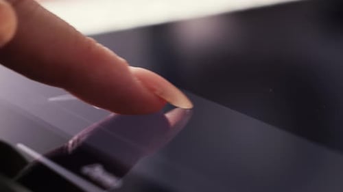 Close Up of Hand Working Electronic Signature on Tablet Write Business Agreement of Contract