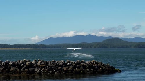 Seaplane taking off in tofino, vancouver island