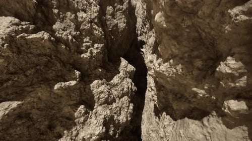 A Very Large Rock Formation with Some Rocks Sticking Out of It
