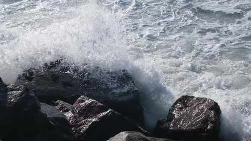 Ocean Waves Crash Against the Rocks on the Coast