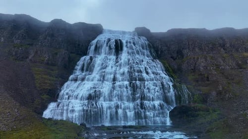 Majestic Dynjandi Waterfall Cascades Down Rugged Icelandic Cliffs in Breathtaking Natural Beauty