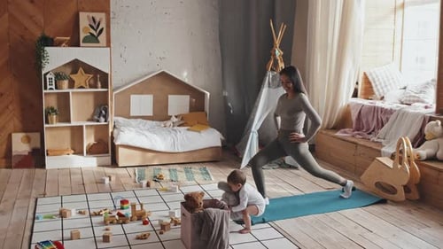 Mother Training in Nursery as baby Playing