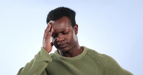 Stress, anxiety and man in studio with headache, vertigo or mistake, trauma