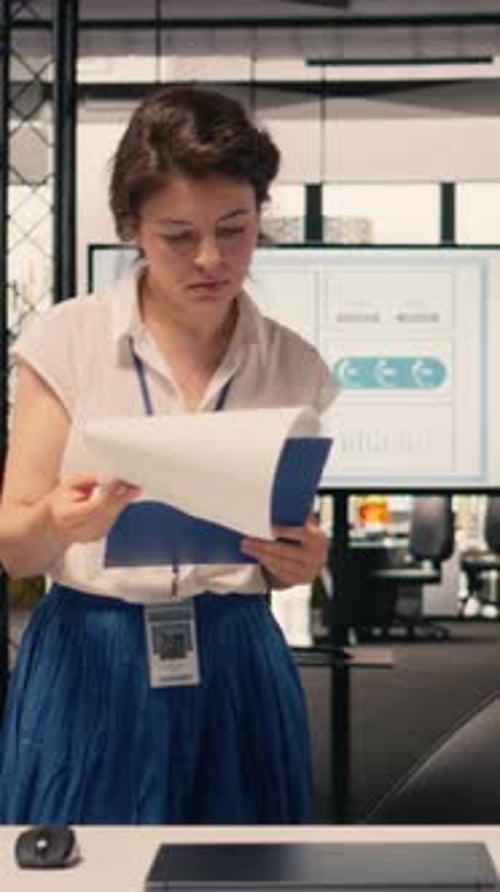 Vertical Video Woman Professional Working Independently in a Modern Office Environment