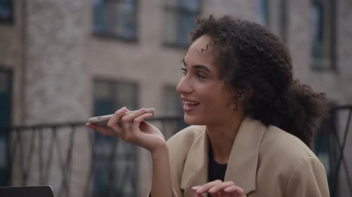 Emotional Woman Record Voice Message Using Smartphone Close Up