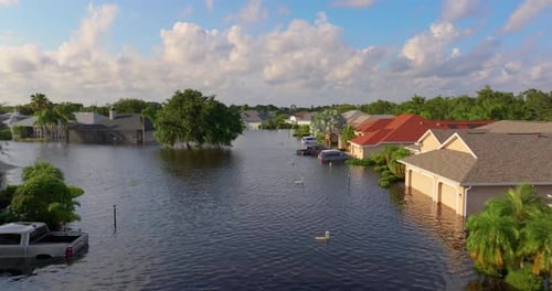 Flooded Houses From Hurricane Rainfall Water in Residential Community in Florida Aftermath of