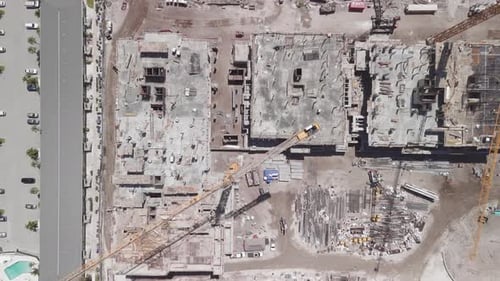 A Construction Development Zone Crane on the Construction Site Aerial Drone Shot