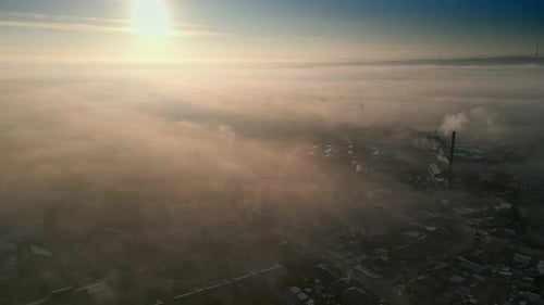 Misty Cityscape Aerial at Sunrise