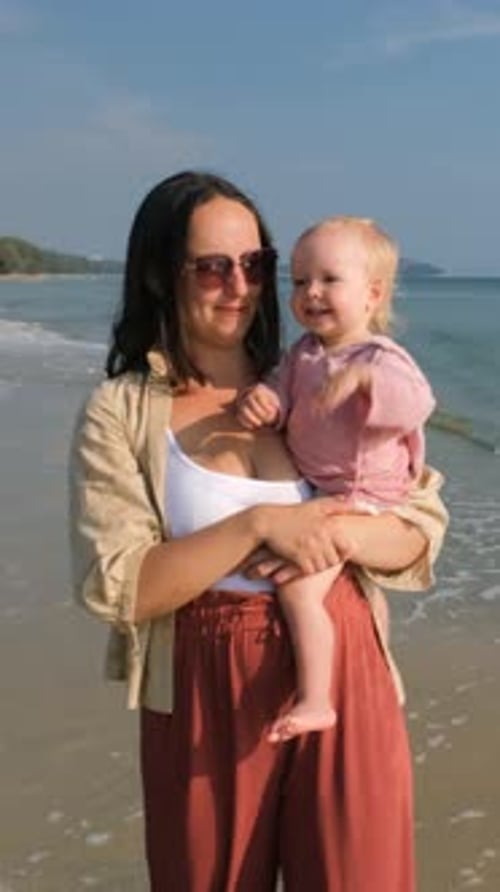 Mother and Child on a Bright Beach