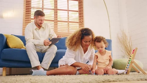 Caucasian family spending leisure free time together indoors in house.