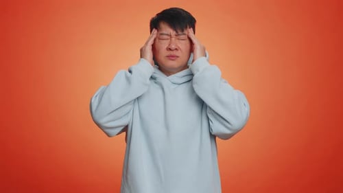 Adult Man Suffering From Headache