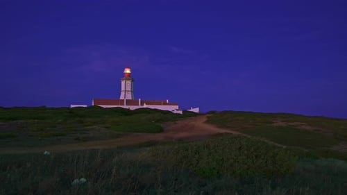 Lighthouse Sending Its Light Beam at Night Cape Espichel Portugal