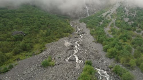 aerial view of a mountain river in the fog. beautiful gorge landscape in the morning. Amazing Natura