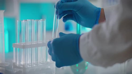 Scientist Handling Test Tube in Bright Laboratory