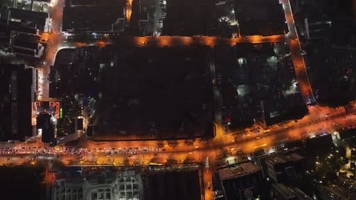 Aerial view of city streets at night, China.