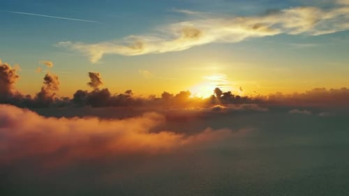 Aerial View of Bright Sunset Clouds