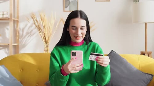 Woman Shopping Online with Smartphone and Card