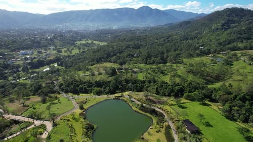 Stunning artificial lake with nature and mountains in the background, man made lake