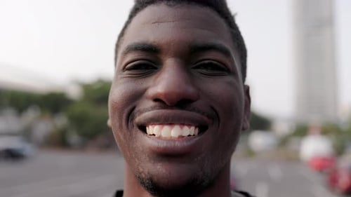 Smiling Man Close Up in Urban Setting