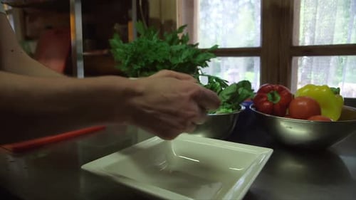 Preparing Fresh Salad in Bright Kitchen