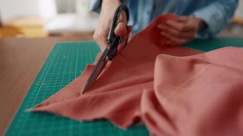 Fashion Atelier Lady Seamstress Cutting Clothes Closeup of Hands with Scissors Creative Hobby and
