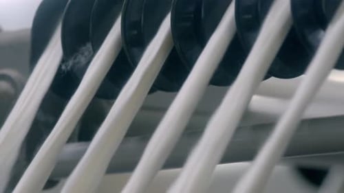 Manufacturing process textile factory. Cotton weaving. Yarn wrapping.