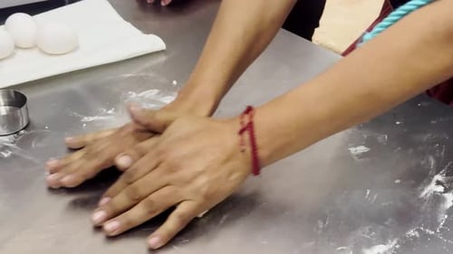 Hands of a baker woman in michoacan mexico