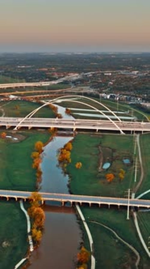 Aerial view of Dallas showcasing intricate bridge designs and green spaces