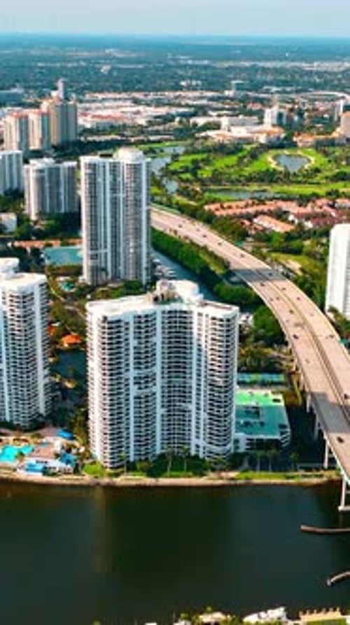 Approaching the gorgeous green sunny panorama of Miami, Florida, USA.