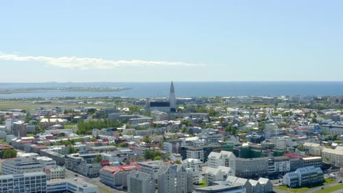 Reykjavik - Iceland - Slow push in across city from from coastline to Hallgrimskirkja.