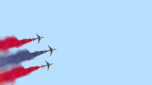 Airplanes Forming American Flag with Patriotic Smoke Trails