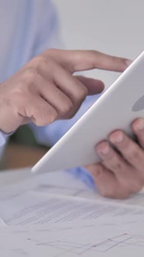 Businessman Using Tablet, Vertical Video