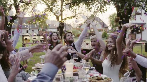 Wedding Celebration with Confetti at an Outdoor Reception
